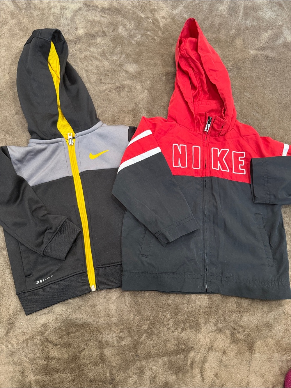 2 Nike Kids Colorblock Hoodies in Red& black and Black, Yellow and Grey.